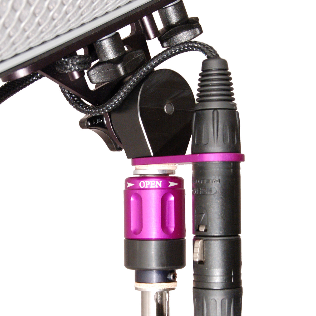 QAT-ECO in use: holding the XLR connector next to the QuickLok at the tip of the boom pole